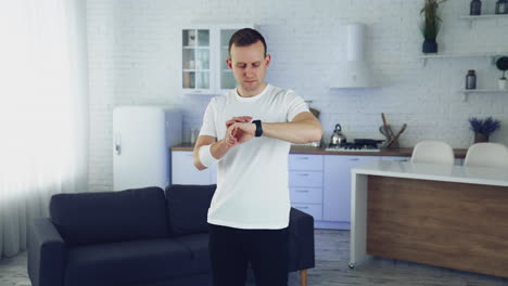 fitness man exercising at home. male fitness man exercising on training at home