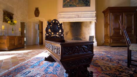 slow orbiting shot of an antique wooden bath sitting in a french chateau