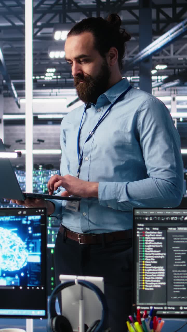 Vertical video Manager supervising work of server room engineer using AI