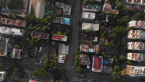 Top-down-view-of-street-and-surrounding-apartment-buildings-in-Chennai-City,-India,-on-a-nice-day