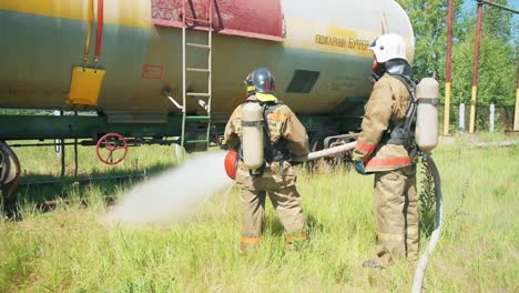 firefighters training on railroad tanker