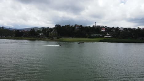 NUWARA-ELIYA,-SRILANKA--:-View-to-the-lake-shore-in-Nuwara-Eliya,-Sri-Lanka-View-of-Lake-Gregory-in-Sri-Lanka-from-a-hotel-balcony