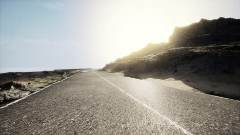 scenic mountain road at sunrise/sunset