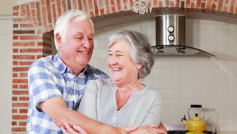 Senior-couple-dancing-together