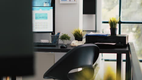 empty company financial department with stock portfolio on computer monitor