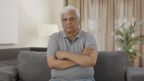 Angry-Indian-old-man-looking-at-the-camera