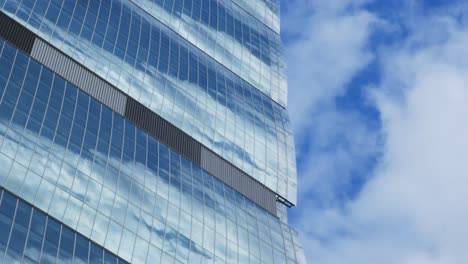 milan city, allianz tower, clouds passing by slowly