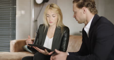 businesspeople sit and have informal meeting