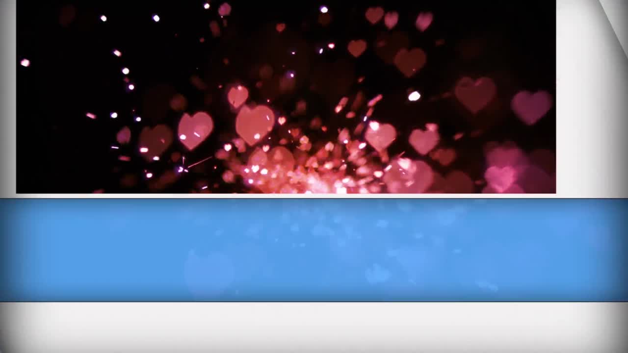 animación de paneles azules y blancos que se abren en corazones rojos y brillo que cae en negro