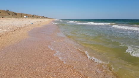 deserted beach of seashells on sea island