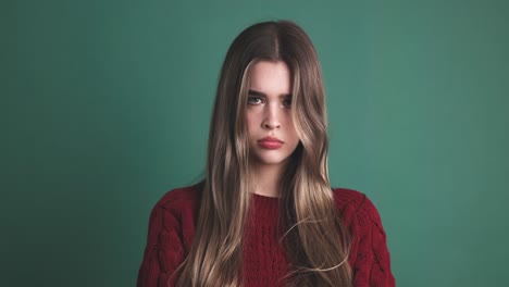 angry young beauty woman standing with arms crossed