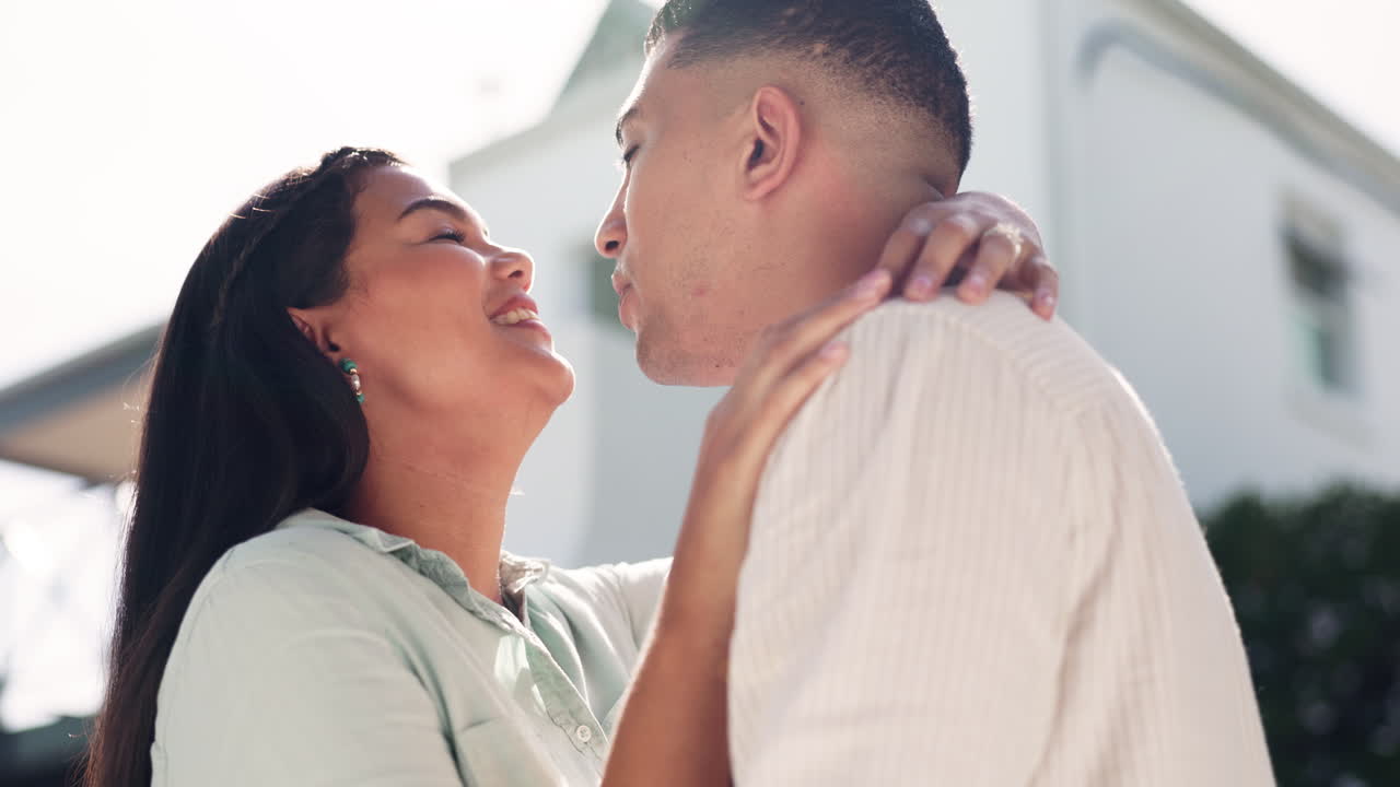 Happy, couple and kiss outdoor for love