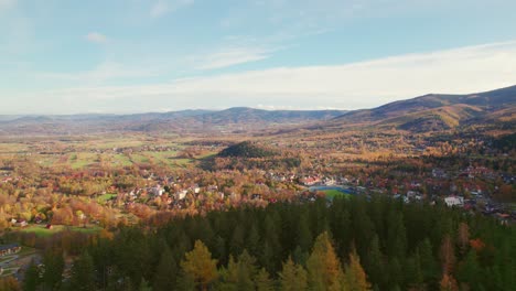 karpacz, poland, mountain city during autumn, fly in drone movement