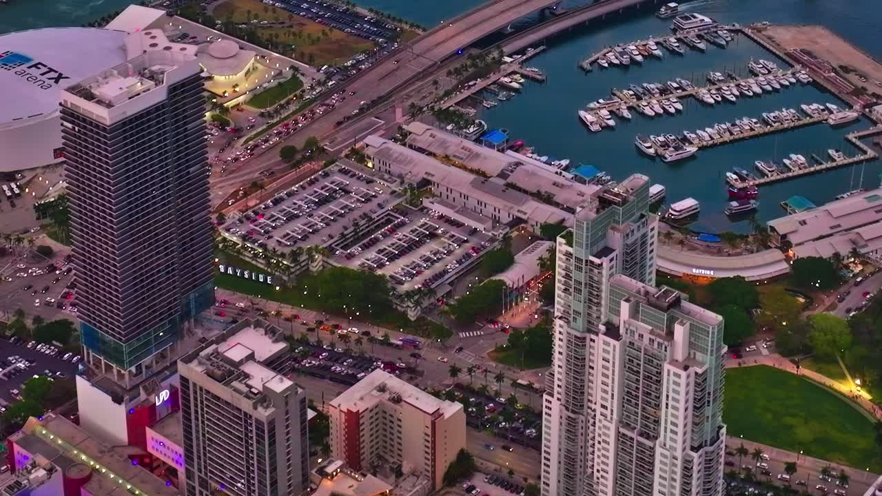 View of Miami's skyline and harbor from above during sunset