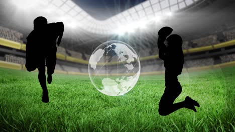 Animation-of-silhouette-of-american-football-players-and-globe-over-sports-stadium
