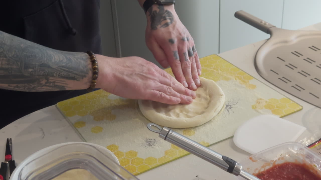 Preparing delicious homemade pizza dough from scratch, focusing on kneading techniques and selecting fresh toppings for the best flavour.