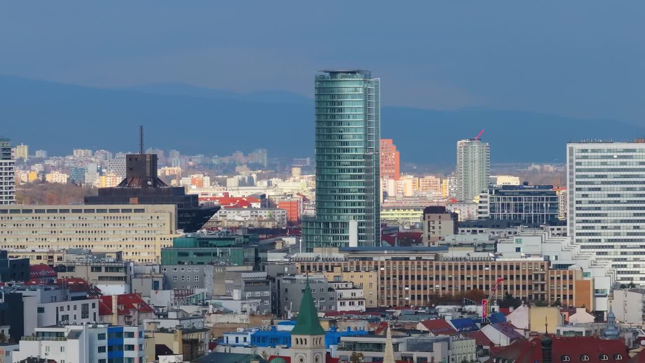 4K Aerial view of Bratislava city, showcasing the vibrant cityscape, historic old town, modern skyline, and the Danube River flowing through the capital. Slovakia_17
