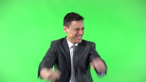 man in suit showing various emotions and expressions on a green screen
