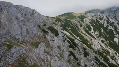 Flying-on-top-of-the-hill-with-a-FPV-drone-above-a-rocky-terrain