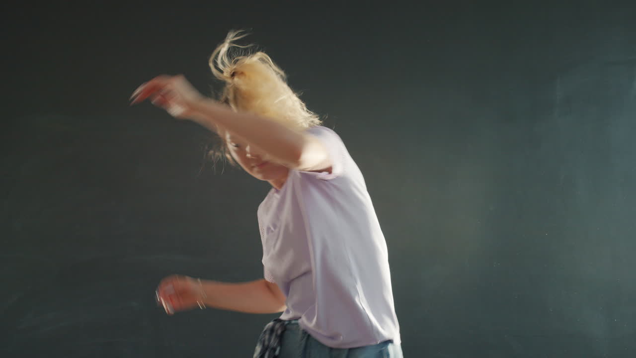 Woman Performing Dynamic Dance Routine