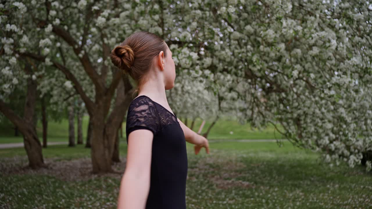 Young Ballerina in a Spring Park