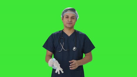 Happy-doctor-removes-mask-after-successful-operation-Green-screen