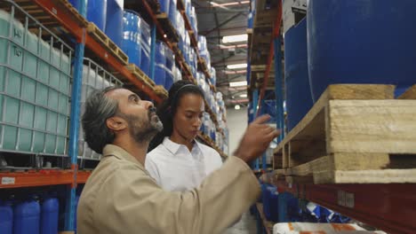 workers interacting in a warehouse