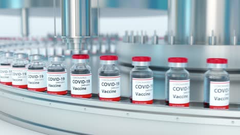 covid-19 vaccine mass production and conveyor line on pharmaceutical factory