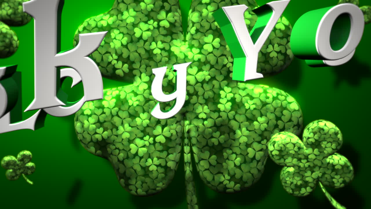 animace zblízka šťastný text a pohyb velké zelené šamrky na den svatého patrika lesklý pozadí