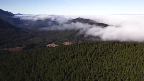 beautiful, slow drone footage on top of the clouds in olympic national park port angeles, washington-1