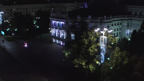 night cityscape with architectural detail and street lighting