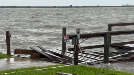 hurricane damage: flooded dock and high waves