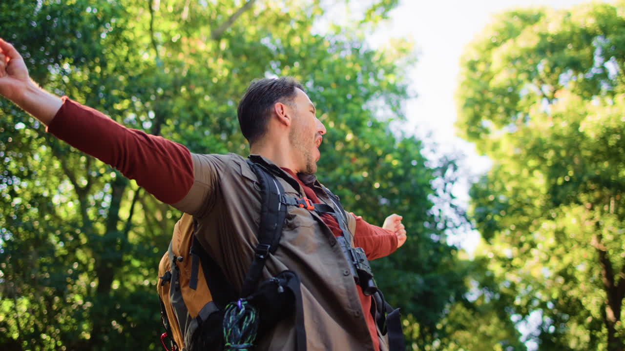 A man hiking in the forest