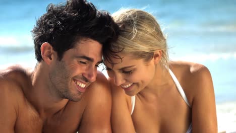 affectionate young couple on beach