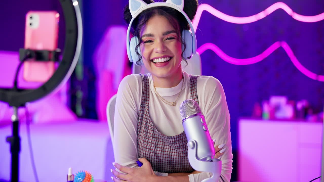 Smiling young woman streaming a podcast