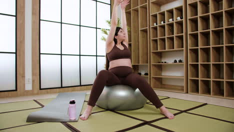 women doing yoga indoors