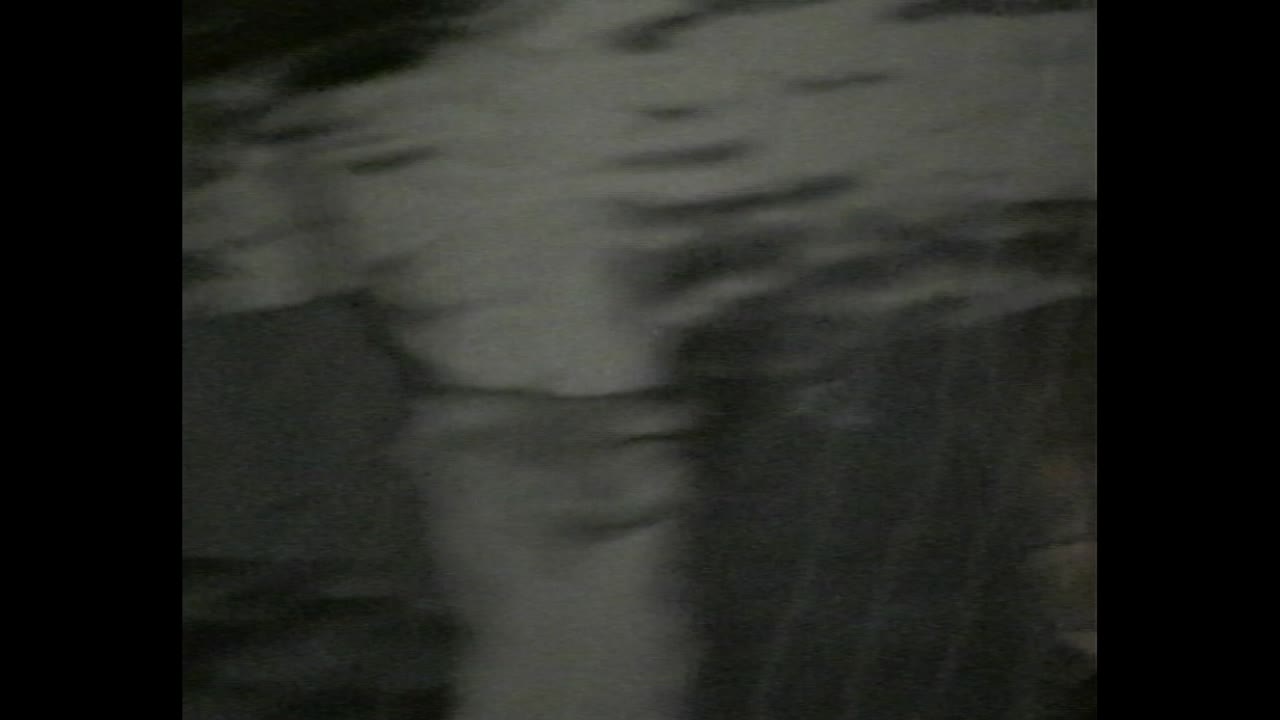 Abstract blurry light shapes in dark environment