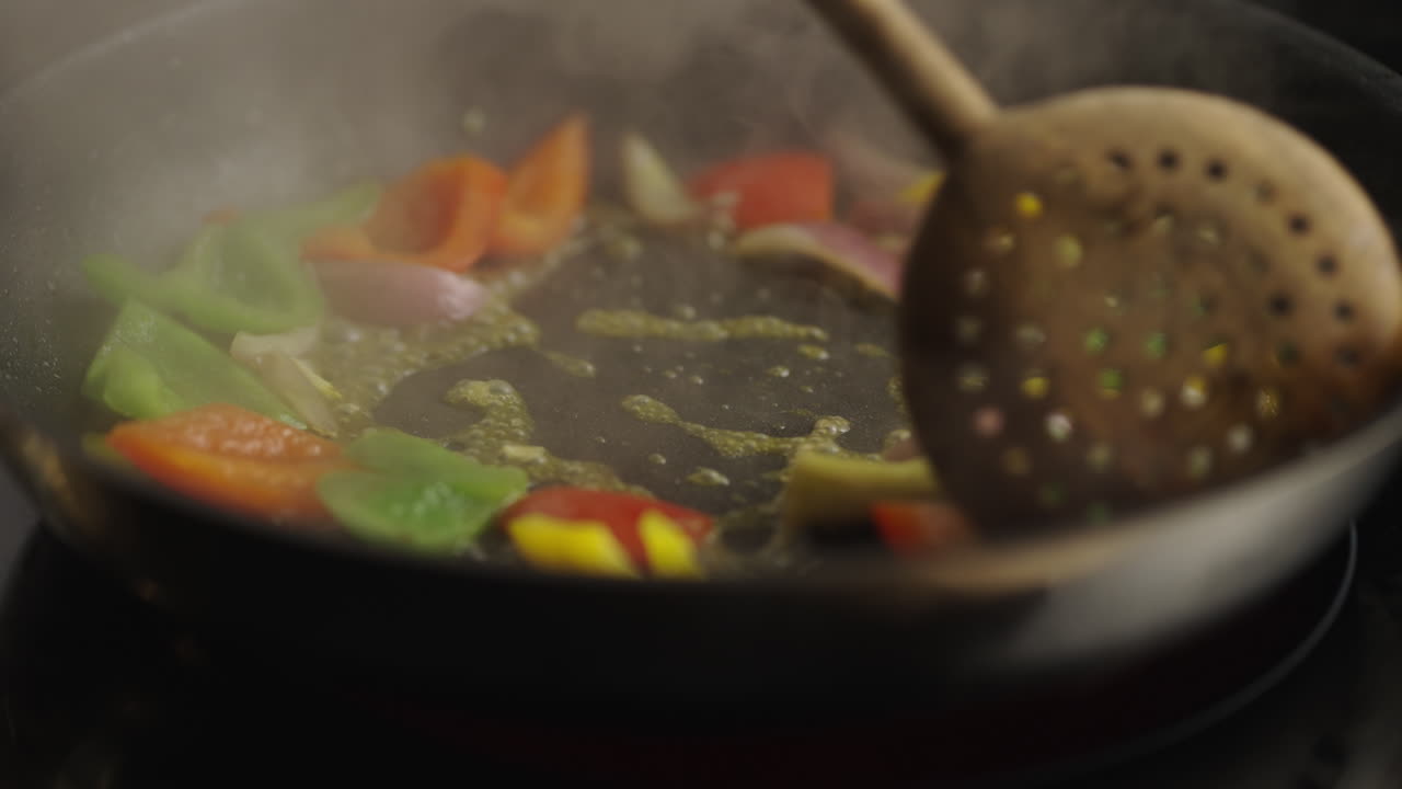 Vegetables being cooked in a skillet