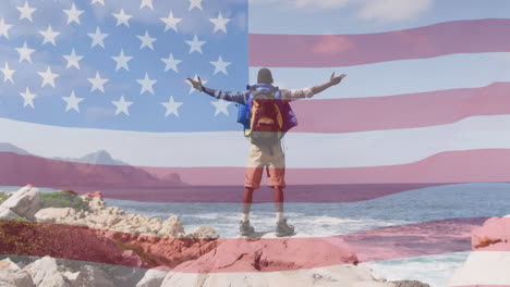 animation of american flag moving over man widening his arms on beach