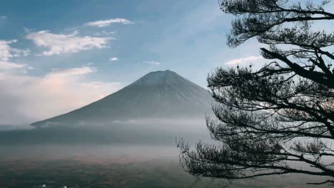 mount fuji with clouds and fog