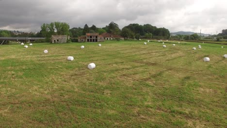 Farmland-scenery-with-haystack-on-the-Field