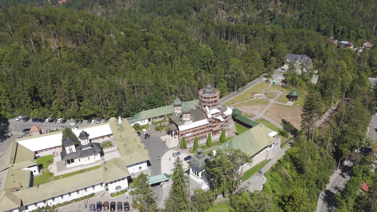 Holy Trinity Church in Sinaia during restoration, highlighting scaffolding and ongoing works