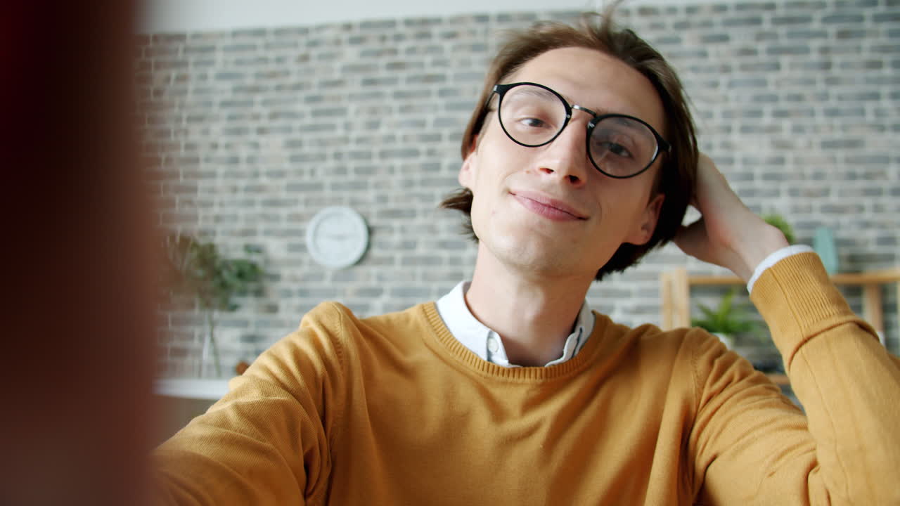 Young Man Smiling in Selfie