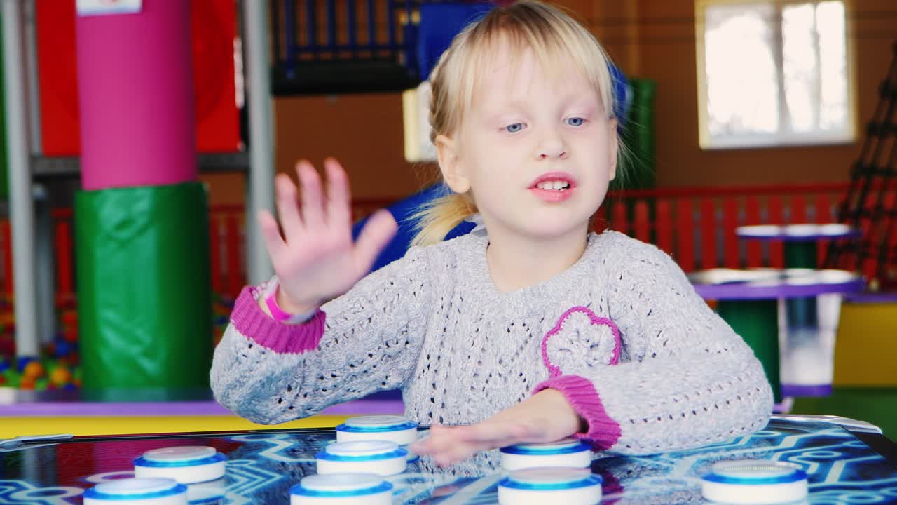 The Girl With Passion Plays A Board Game In The Entertainment Center Active Rest With Children Conce