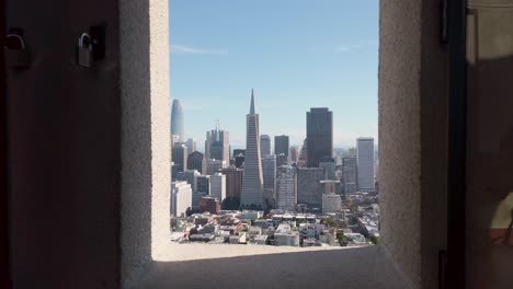 san francisco downtown and neighborhoods skyline panorama from coit tower window