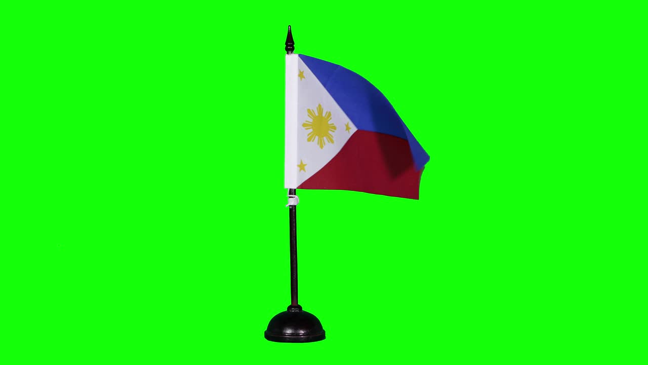 Philippine miniature flag fluttering on a flagpole