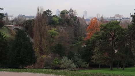 view of paris cityscape from the buttes-chaumont park