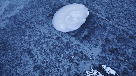 A drone&#039;s glimpse of the winter scene over a river or lake
