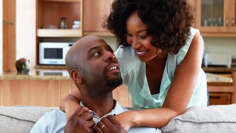 couple embracing each other in living room 4k