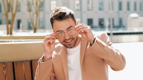 stylish man in a beige jacket